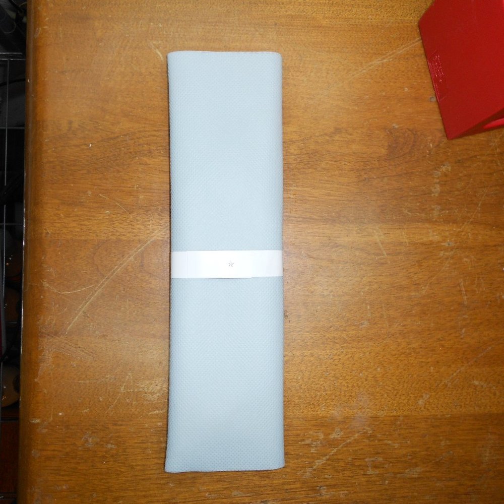 24 sets of plastic silverware Napkin in a folded placemat  new Delta Airlines